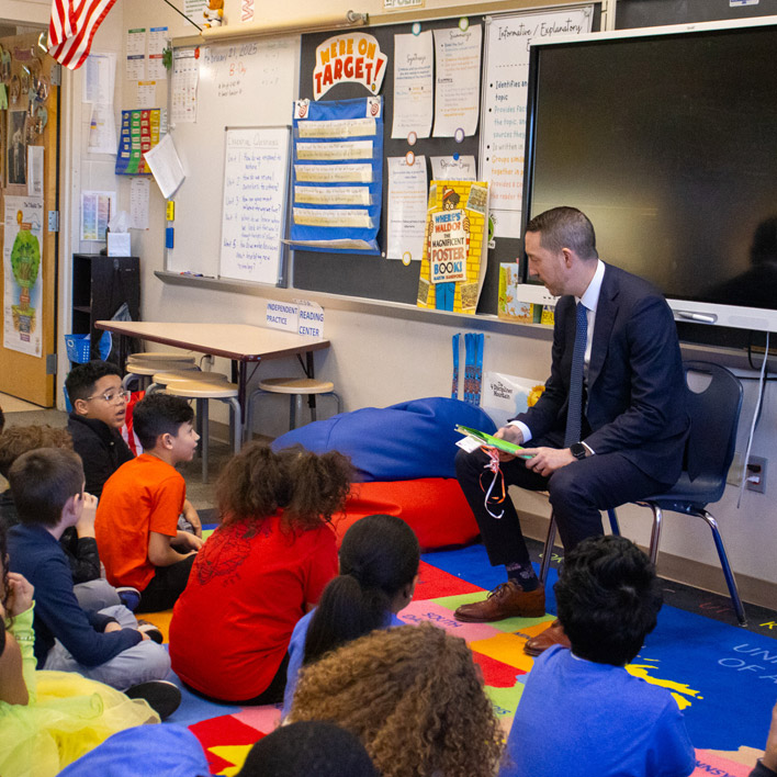 Waterbury, CT Superintendent Darren Schwartz engages with a classroom of elementary school students