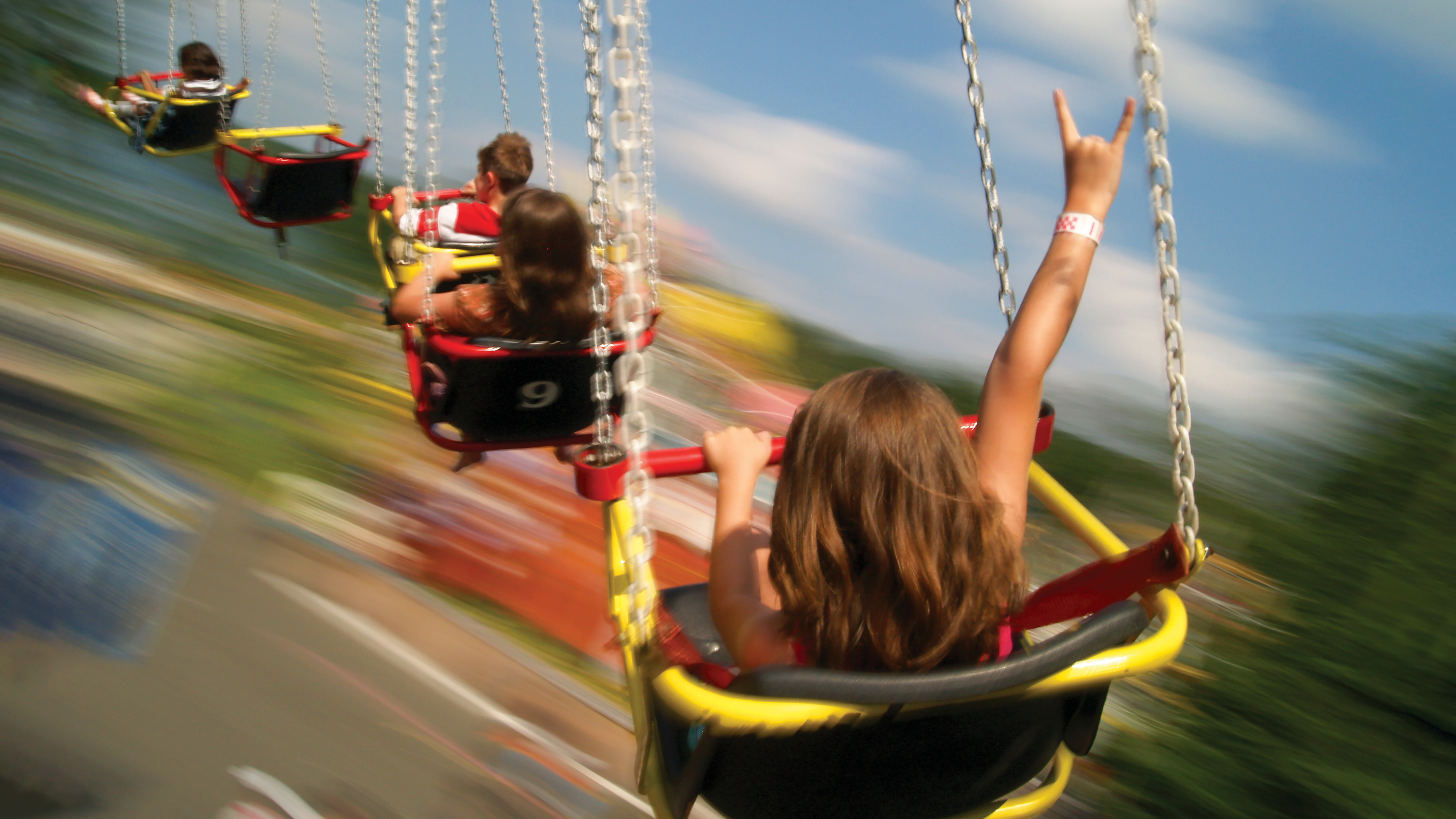 Kids enjoying the roller coaster at Quassy Amusement Park in Middlebury, CT