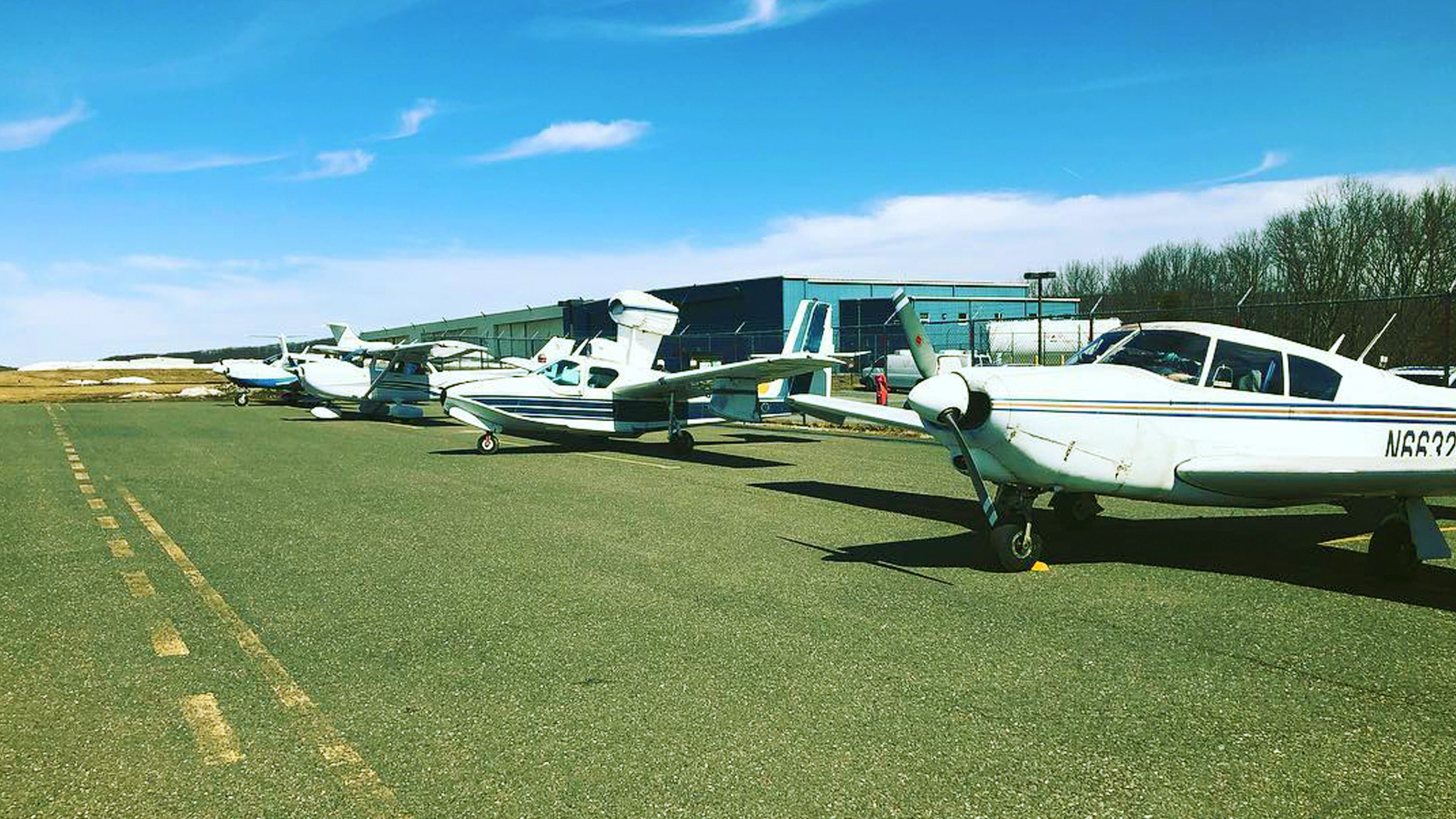 View of several airplanes at the Waterbury-Oxford Airport