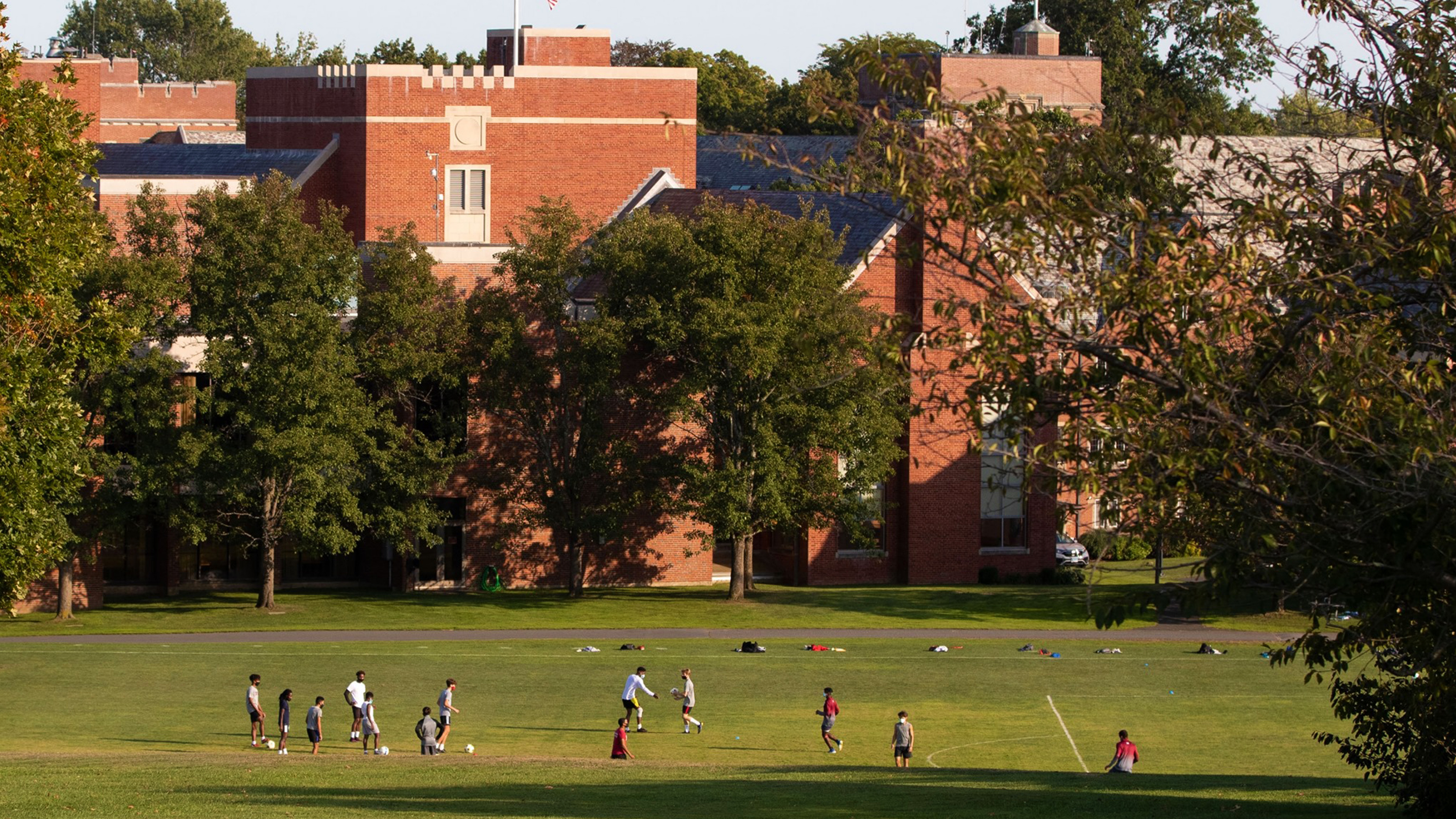 Soccer team playing on the lawn of the Taft School campus in Watertown, Connecticut