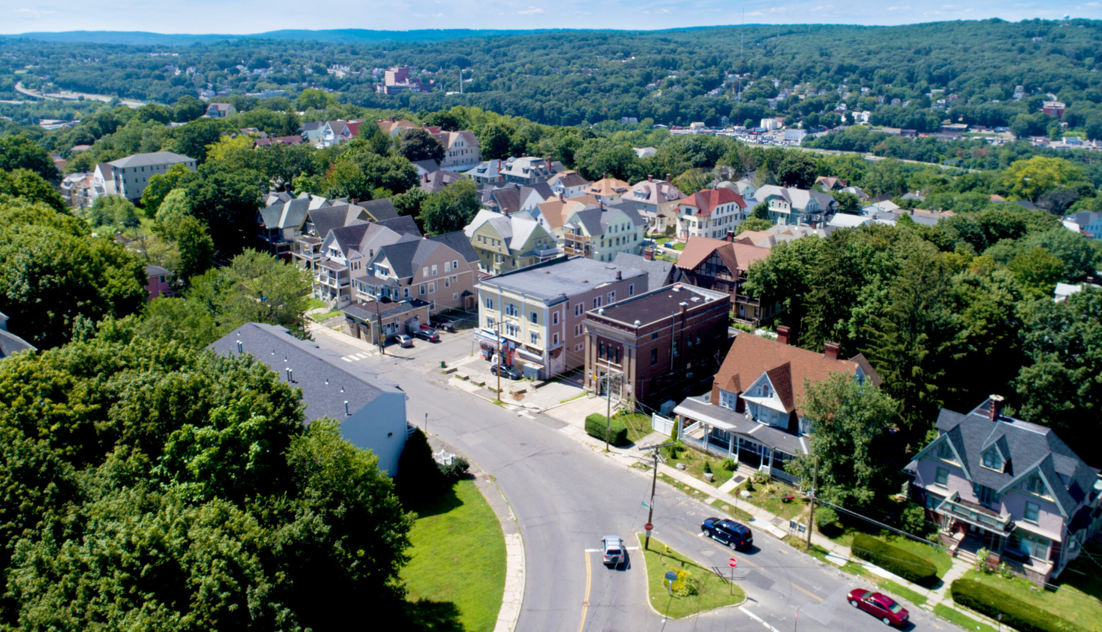 An aerial view of buildings and streets in the Willow Plaza neighborhood in Waterbury 