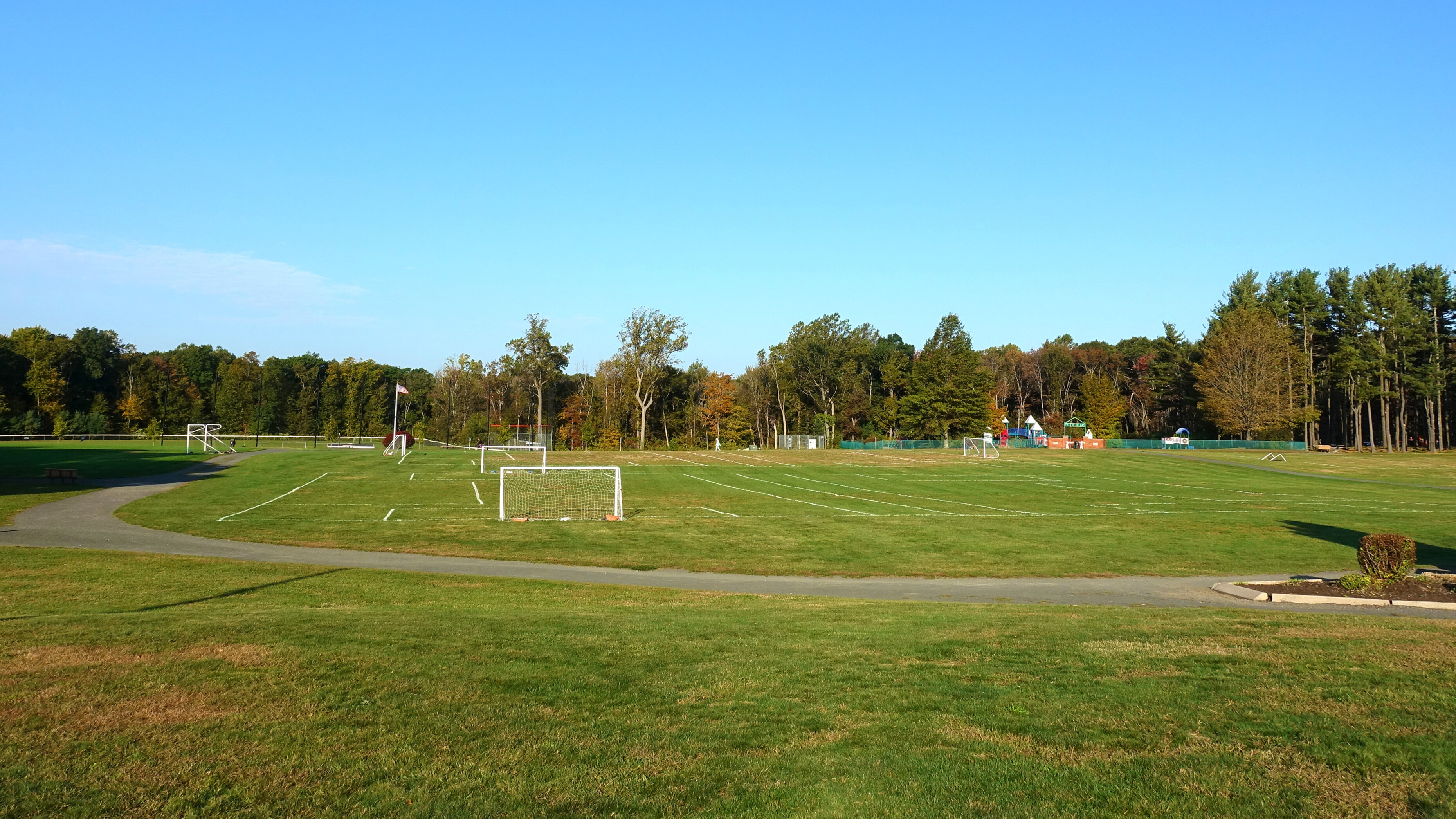 Soccer fields and walking path at Hotchkiss Field park in Prospect, CT
