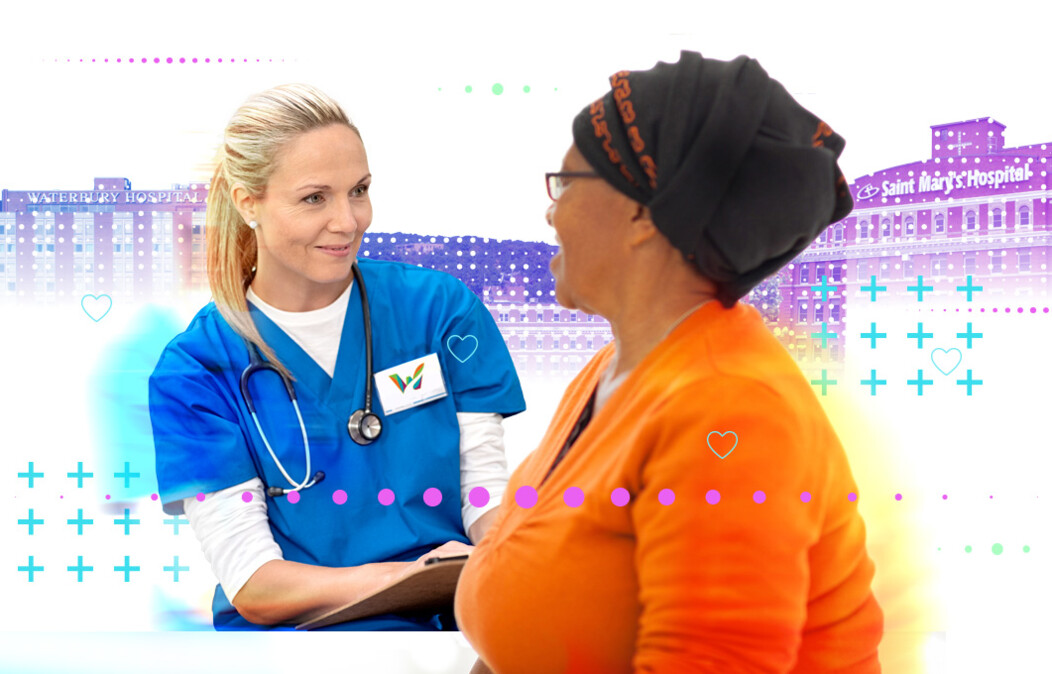 Female healthcare worker wearing a Waterbury badge speaking to a female patient and taking notes