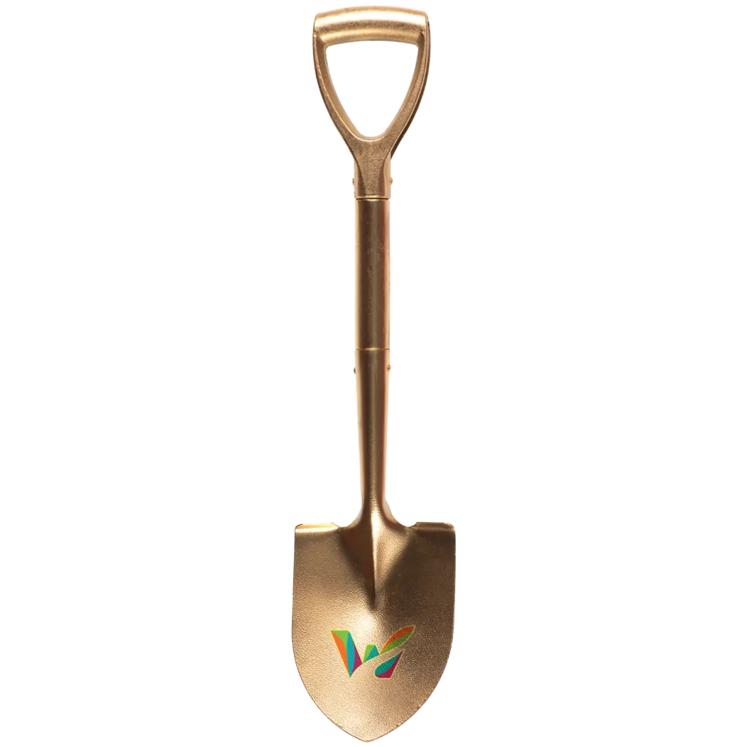 A brass shovel with the Waterbury, CT logo on the front
