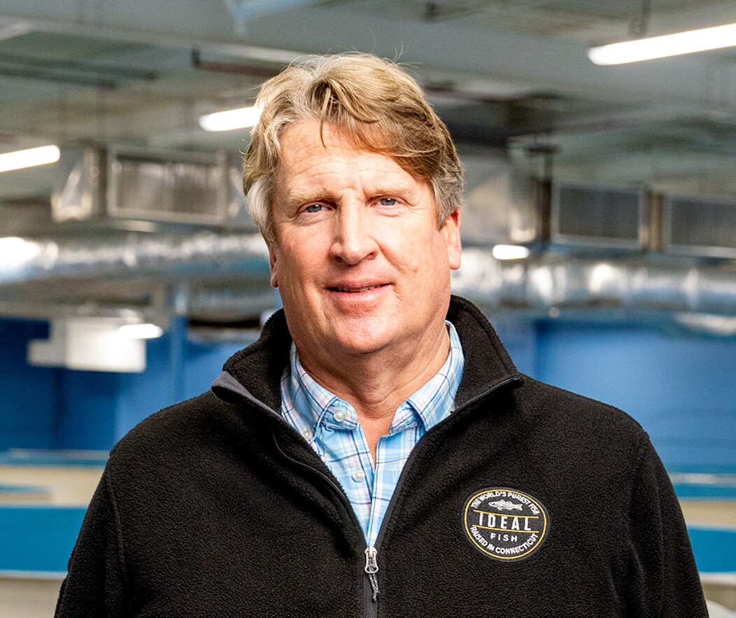 Portrait of Ideal Fish CEO Eric Pedersen inside his saltwater fish farm facility