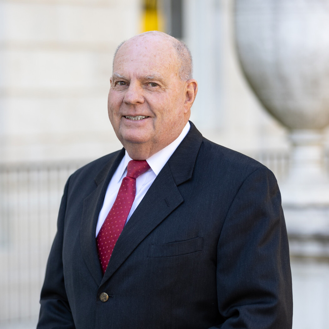 Headshot of Joe McGrath, Waterbury Economic Development Director, in front of City Hall