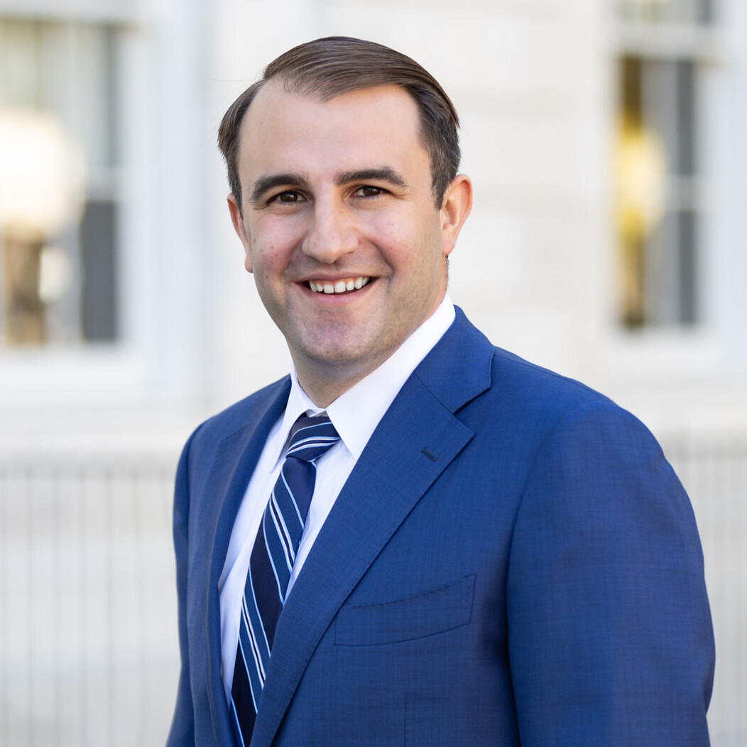 Photo headshot of Thomas Hyde, Executive Director of the Naugatuck Valley Regional Development Corporation, in front of Waterbury City Hall