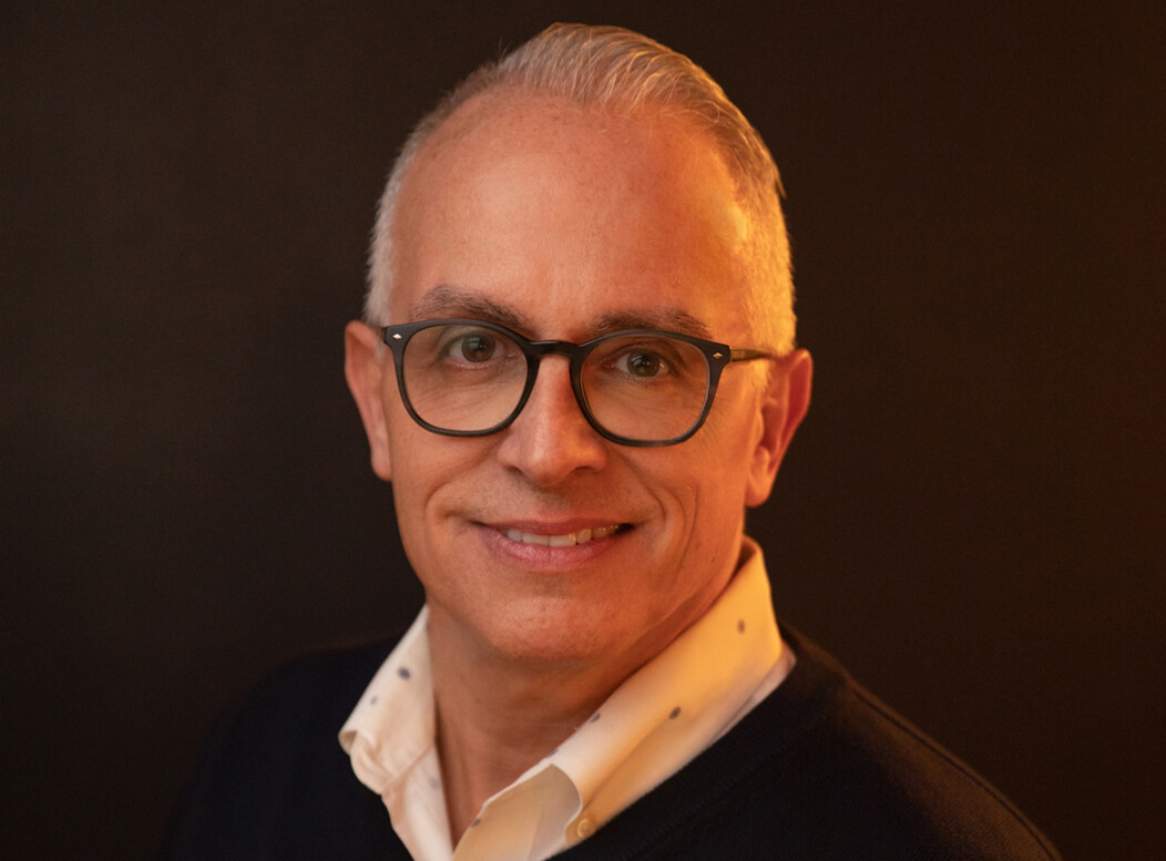 Smiling headshot of Frank Tavera, CEO of The Palace Theater in Waterbury CT