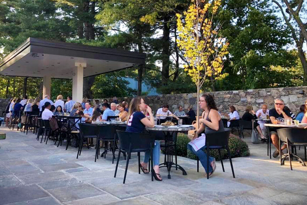 Diners on the outdoor patio terrace at Viron Rondo Osteria restaurant in Cheshire, CT